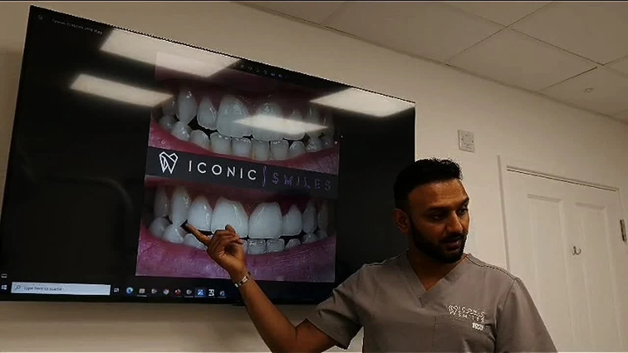An Iconic Smiles clinician explaining treatment images